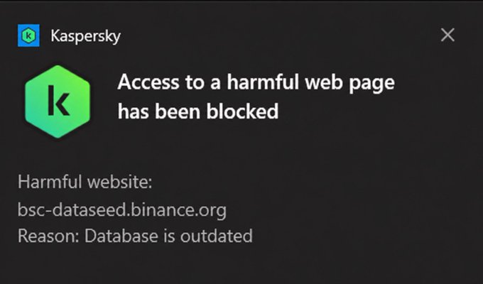 A Kaspersky security notification stating 'Access to a harmful web page has been blocked' for bsc-dataseed.binance.org, with the reason given as 'Database is outdated'.