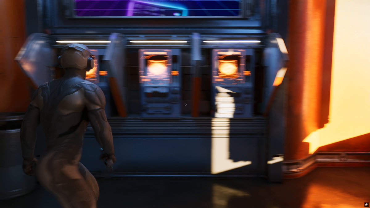 The image features a man standing next to a machine with a screen that displays "WILD". This suggests that the scene might be related to an action-adventure or science fiction game, where players often encounter futuristic technology or environments. The presence of the "WILD" label on the machine could indicate that it is part of such a game or scenario.