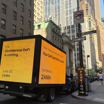 The image shows a large truck parked next to a street with tall buildings, including one that has a sign saying "No Parking." The truck displays an advertisement for a new type of cryptocurrency called ZAMA. The text on the advertisement reads "Confidential DeFi is coming," and it also mentions that the company's platform could be worth millions. This suggests that the truck might be promoting or advertising the launch of this new cryptocurrency, which has the potential to generate significant returns for its investors.