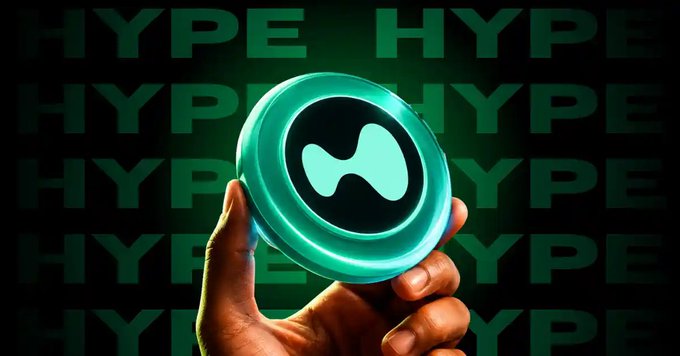 A hand holds a glowing teal circular token with a simple white symbol, set against a dark background repeatedly displaying the word “HYPE.”