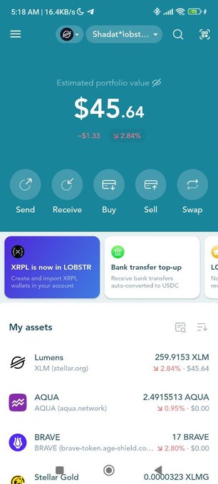 The image shows a LOBSTR wallet app screenshot displaying an estimated portfolio value of $45.64, with 259.9153 XLM (Lumens) being the main holding, supporting the post about finding forgotten cryptocurrency. The asset list also shows smaller amounts of AQUA, BRAVE, and Stellar Gold tokens in the user's account.
