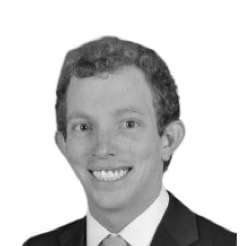 The image shows a black and white photo of a man wearing a suit, smiling for the camera. The caption below the image reads "FOUNDER OF ONDO FINANCE SUDDENLY PASSES AWAY - $ONDO DROPS 10%". This suggests that the image is related to a post about Nathan Allman's passing away in the @OndoFinance market.