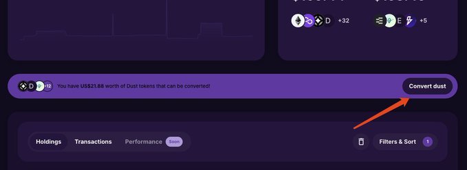 A screenshot of Jumper Exchange's Portfolio dashboard highlights a purple "You have US$21.88 worth of Dust tokens that can be converted!" banner with an arrow pointing to the "Convert dust" button, demonstrating the one-click dust reclamation feature mentioned in the tweet.