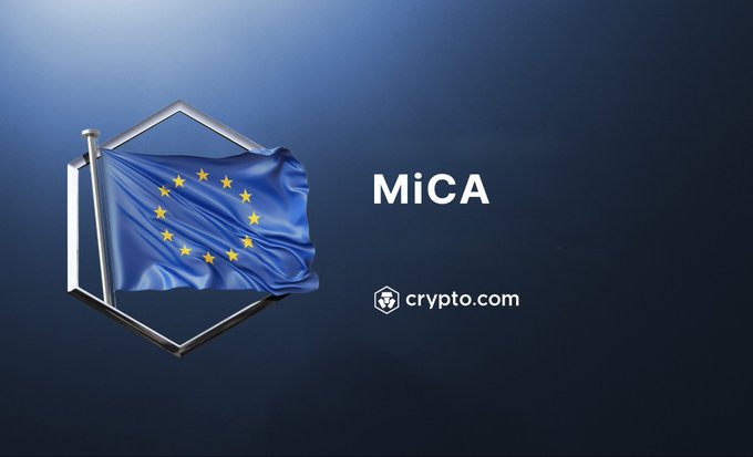 The image features a blue flag with yellow stars flying from a flagpole against a dark background. The text "MiCA" is written below the flag, indicating that the image is related to the cryptocurrency project MiCA. The caption also mentions that the deadline for MiCA has passed and that Crypto.com isn't prepared for it yet.