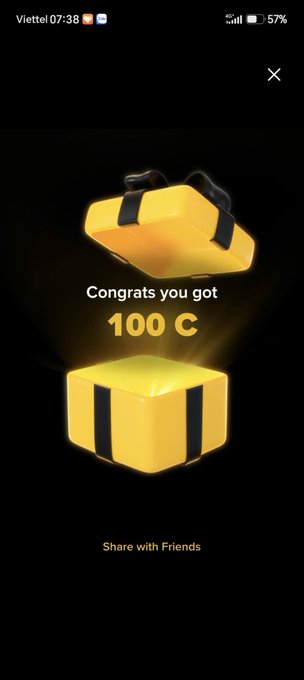 The image shows a gift box with a yellow ribbon, which has been opened by someone. The text "Congratulations you got 100 C" is displayed above the open gift box. This message congratulates the person who received the gift for reaching 100 C on their account or challenge.