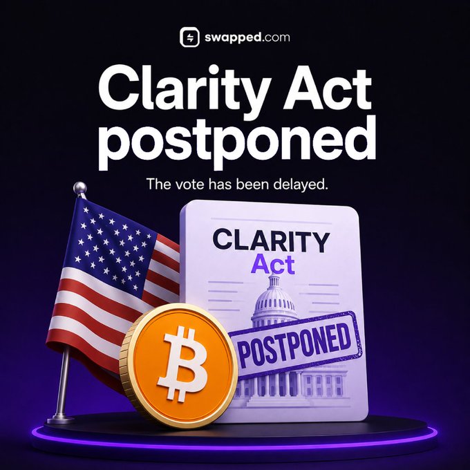 The image, shared by swapped.com, displays a graphic announcing that the Clarity Act vote has been postponed, featuring a Bitcoin coin, an American flag, and a document stamped "POSTPONED" — visually reinforcing the news that the US Senate has delayed the vote to September due to insufficient agreement on the 60 votes needed before the August recess.