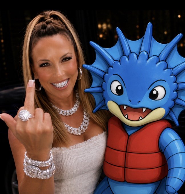 A woman with long highlighted hair, a bright smile, and elaborate diamond jewelry flashes a rude gesture next to a cartoon blue dragon mascot wearing a red vest, in a celebratory meme-style image promoting the $SERP token launch on SuiPump.