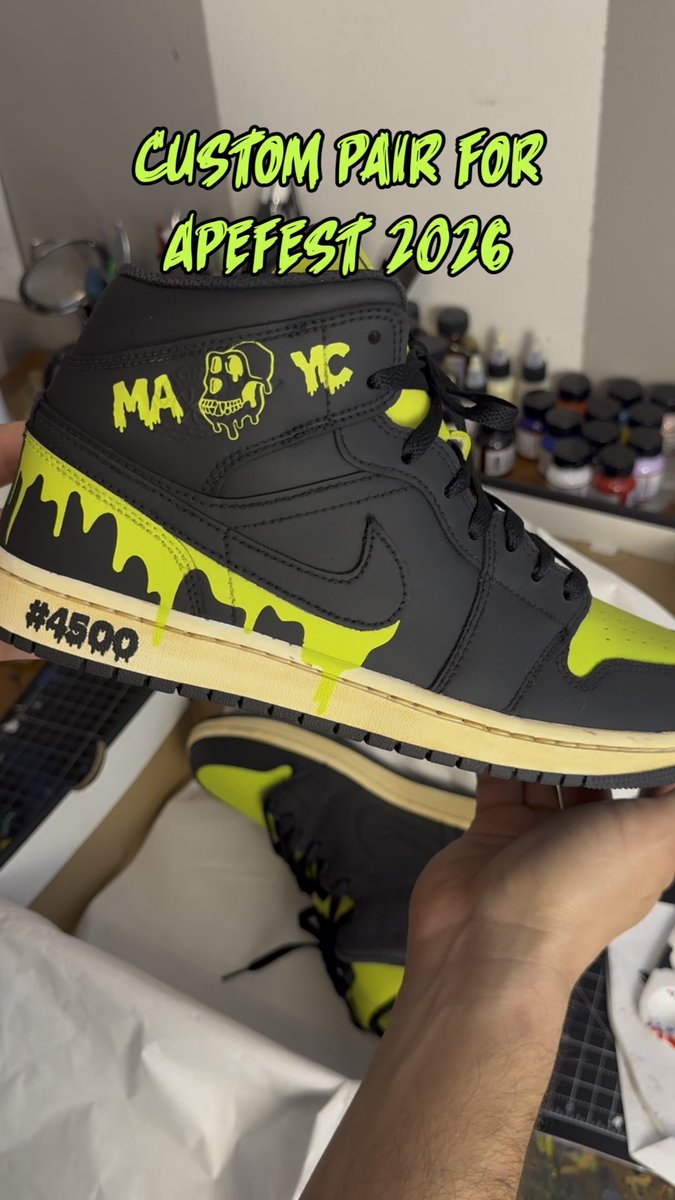 A custom pair of black and neon green Air Jordan 1 sneakers with slime drip details, a skull graphic, 'MA YC' text, and '#4500' on the midsole, labeled 'CUSTOM PAIR FOR APEFEST 2026'.