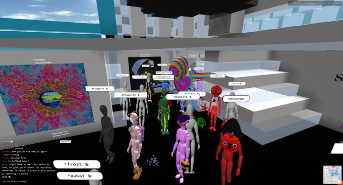 A screenshot from a virtual world platform shows numerous colorful avatars gathered in a room with a psychedelic wall poster and floating usernames like 'FurReal' and 'auuki'.