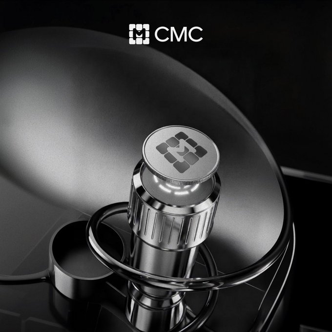 A sleek black and silver image featuring the CMC logo with a metallic microphone-like device on a dark reflective surface.