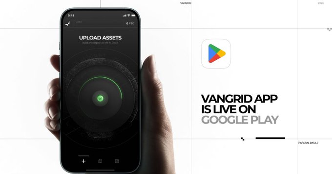 A hand holds a smartphone displaying the "UPLOAD ASSETS" screen of the Vangrid app. To the right, text reads "VANGRID APP IS LIVE ON GOOGLE PLAY" with the Google Play logo.