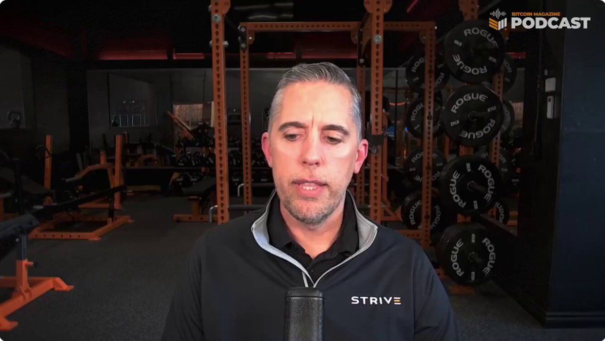 The image features a man wearing a black shirt, standing in front of a gym with various exercise equipment such as dumbbells and weight machines. The man appears to be talking about digital credit payments or discussing the benefits of using digital currency over traditional money market accounts.