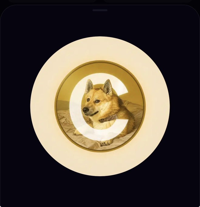A smartphone lock screen displays the "C" logo of the Coinbase app, overlaid with a Shiba Inu (Doge) dog wearing a gold coin, visually representing the "$Doge2" cryptocurrency token.