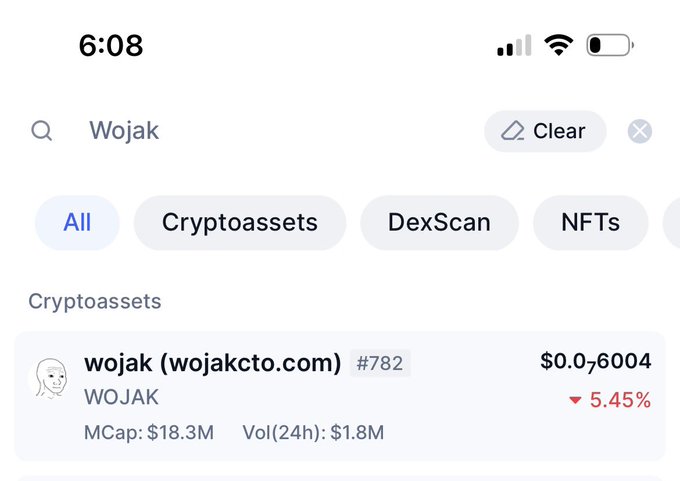 The image shows a computer screen with an open tab that displays information about the cryptocurrency WOJAK, also known as Wojak or Ojak. The text on the screen reads "When you go to search for WOJAK on CMC you will only see the real OG show up Very nice!". The title of the image is "6-08", which is the date that this post was published.