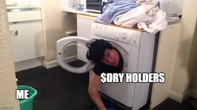 A humorous meme showing a man looking inside a front-loading washing machine labeled '$DRY HOLDERS', while another label 'ME' points to the empty space behind him.