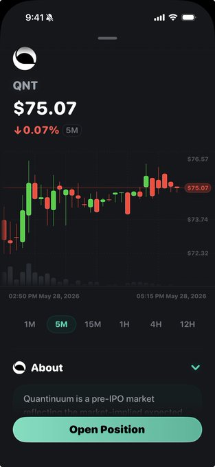 The image shows a phone screen displaying a stock chart with a red line indicating a downward trend, along with text that reads "QNT is available to trade in Rainbow." The phone's position suggests that someone might be looking at this information while they are using their phone.