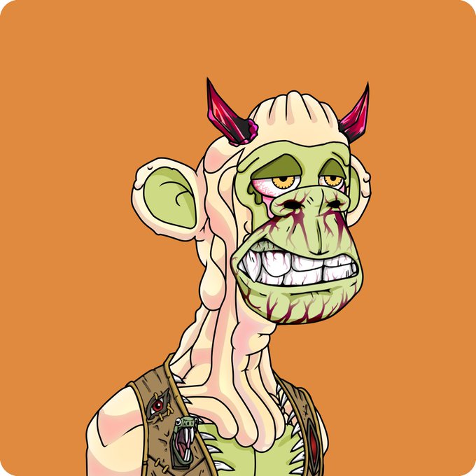 A cartoon illustration of a green-skinned monkey-like character with red devil horns, a wide toothy grin, and blood-like markings on its face, set against an orange background.