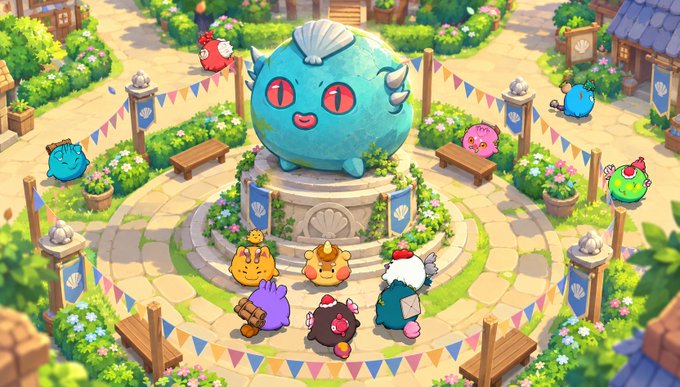 A colorful digital illustration showing various cute, round monster-like creatures gathered around a large blue creature on a pedestal in a festive town square decorated with flags and flowers.