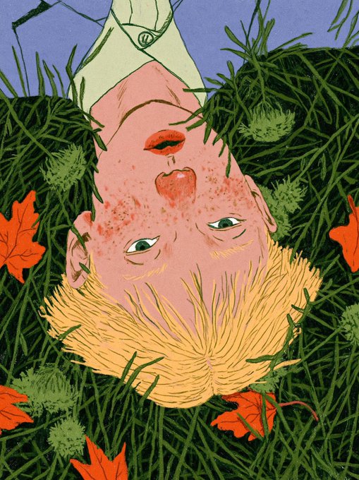 An upside-down illustrated portrait of a freckled figure with a red apple in their mouth, blonde hair, and wearing a green shirt, lying in grass with scattered autumn leaves.