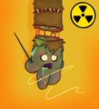 A cartoon character with a box-like head, green pants, and a radiation symbol, holding a stick against an orange background.