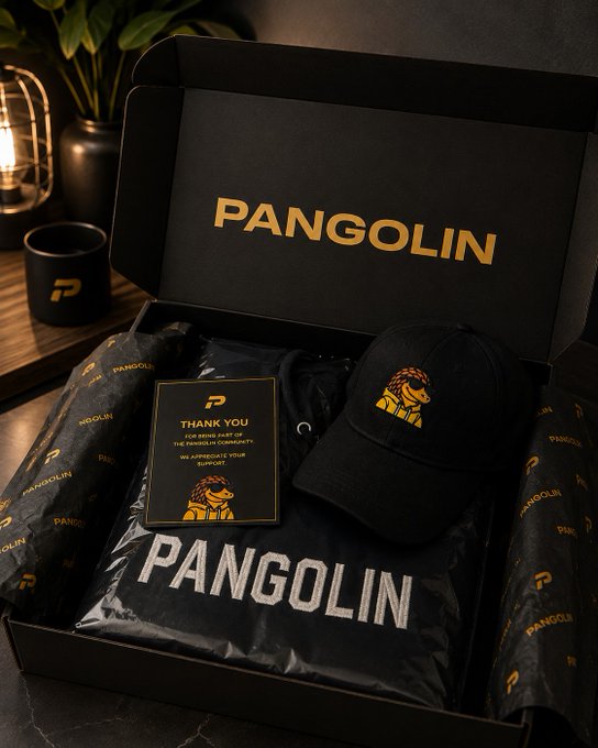 A branded gift box labeled 'PANGOLIN' containing a t-shirt, cap, and thank-you card, all featuring the Pangolin logo and imagery in black and gold.