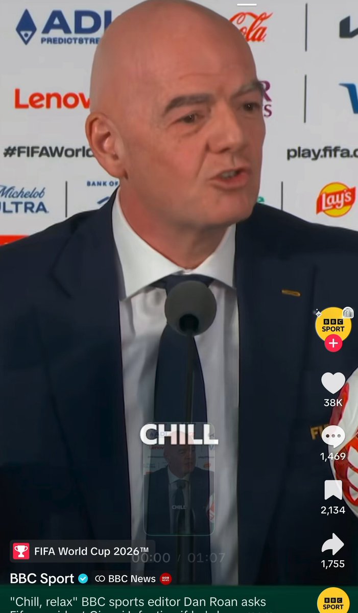 The image features a man wearing a suit, talking into a microphone at an event. The text "JUST IN: head of FIFA Gianni Infantino does a public soft shill for $CHILLGUY ahead of the World Cup." is present in the image. This suggests that the man might be promoting or discussing something related to the upcoming FIFA World Cup, possibly a product or service associated with it. The post also includes other mentions like "FIFA World Cup 2026," "BBC Sport," and "BRB Sports Editor Dan Ronin asks." These details further support the idea of an event related to the FIFA World Cup.