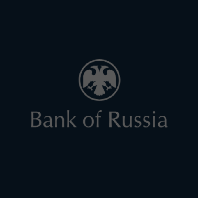 The image displays the logo and name "Bank of Russia," featuring a stylized double-headed eagle emblem in a circular frame above the text. This relates to the accompanying news that Russia's central bank is proposing to allow cryptocurrencies like Bitcoin, Ether, and USDT to trade on regulated exchanges.