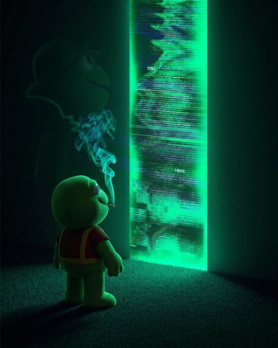 A small green toad plush figure wearing a red vest smokes a cigarette while gazing into a glowing vertical portal displaying static and the words "STILL" and "HERE," with its large shadowy silhouette looming on the wall behind—evoking the meme's eerie, otherworldly vibe as $TOAD "opens the next chapter of Web3."