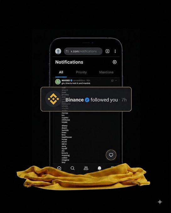 A smartphone displays a Twitter/X notifications page with a highlighted notification from "Binance" with a blue verified checkmark stating "followed you · 7h," set against a dark background with golden fabric draped at the base. The image humorously plays on the post's claim that Binance secretly loves MAX, using the unexpected follow notification as visual "proof" of this connection.