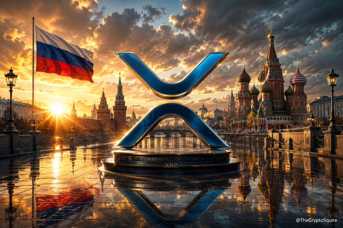 A giant blue XRP logo sits on a pedestal in front of Moscow's iconic St. Basil's Cathedral and the Russian flag at sunset, symbolizing Russia's reported move toward launching live crypto services via its largest bank on December 1. The "XRP" inscription on the pedestal and the Russian tricolor flag directly tie the cryptocurrency to the country's growing financial adoption of digital assets.