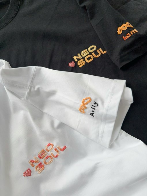 Embroidered t-shirts displayed with the text 'NEO SOUL' and pixelated designs resembling NFT profile pictures and usernames.
