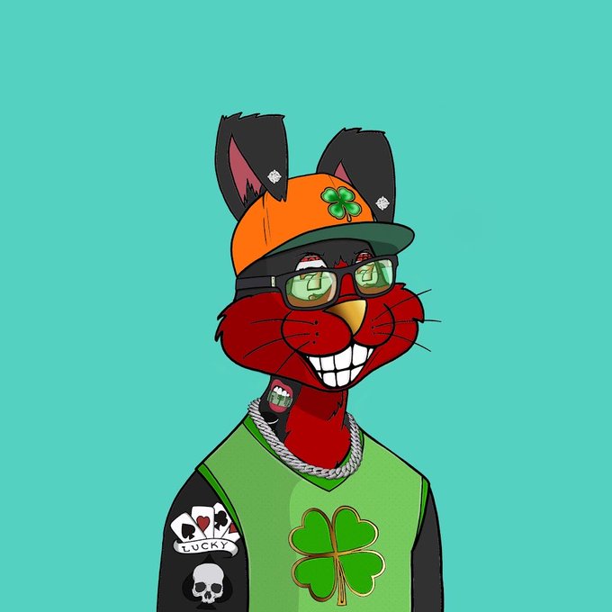 A cartoon illustration of a red cat character wearing an orange cap with a four-leaf clover, green glasses, and a green shirt featuring a skull and 'LUCKY' card design.