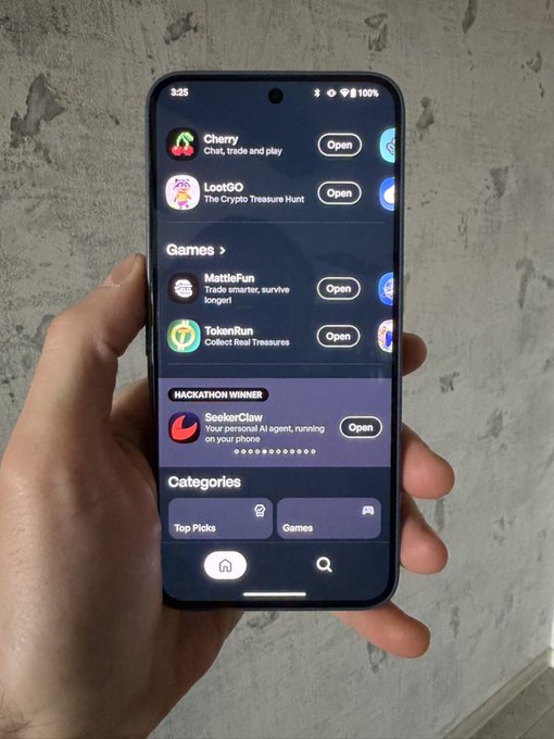 A hand holds a smartphone displaying a Solana dApp Store interface featuring apps such as “Cherry,” “LootOO,” “MettleFun,” “TokenRun,” and “SeekerClaw,” with a “HACKATHON WINNER” label visible. The image supports the post’s call to share Solana app links by highlighting the Seeker ecosystem and other discoverable dApps.