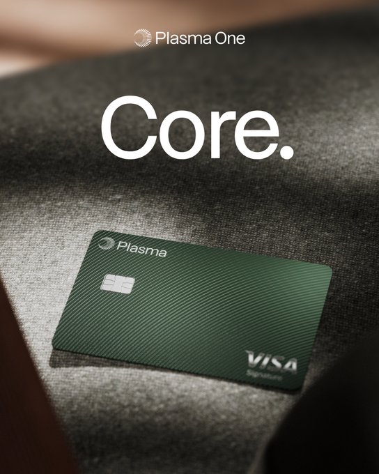 The image shows a green Plasma "Core" Visa Signature credit card resting on a gray textured surface, with the "Plasma One" logo at the top. This complements the post by showcasing the newly introduced physical card as part of the expansion beyond Apple Pay and Google Pay.