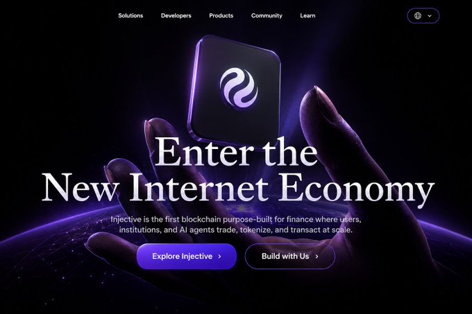 Website homepage for Injective blockchain, showing a dark purple background with a glowing logo and the tagline 'Enter the New Internet Economy,' describing it as 'the first blockchain purpose-built for finance where users, institutions, and AI agents trade, tokenize, and transact at scale.'