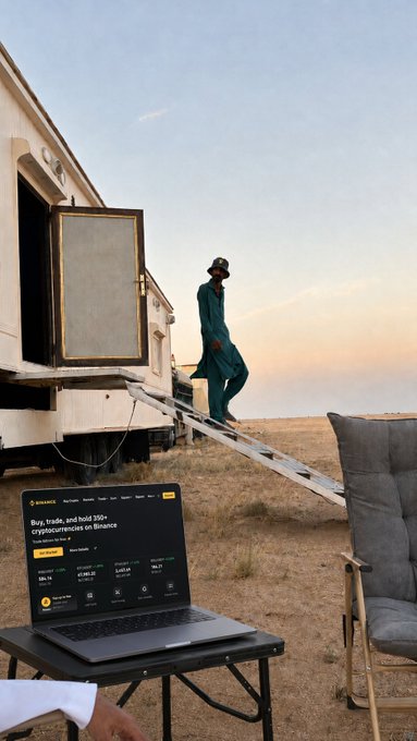 A crypto trader descends the steps of a rustic caravan while a laptop displays the Binance homepage advertising "Buy, trade, and hold 350+ cryptocurrencies on Binance," illustrating the post's message about Binance being just one tap away anywhere on your journey.