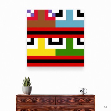 A colorful, pixelated geometric art print hangs on a wall above a wooden cabinet holding a potted succulent and a mug, featuring abstract blocks of red, blue, yellow, green, and brown.
