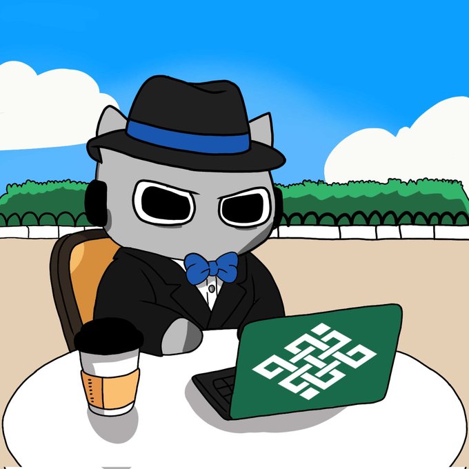 A cartoon gray cat dressed in a black suit, blue bow tie, and fedora sits at an outdoor café table working on a laptop displaying the "INITIATE" logo, with a coffee cup beside it—visually representing the "working weekend" and tagging of @Initiatenft_.