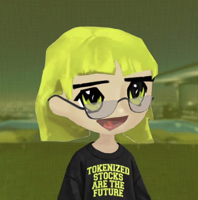 A cartoon-style 3D character with yellow hair, green eyes, and glasses wearing a black shirt that reads "TOKENIZED STOCKS ARE THE FUTURE".