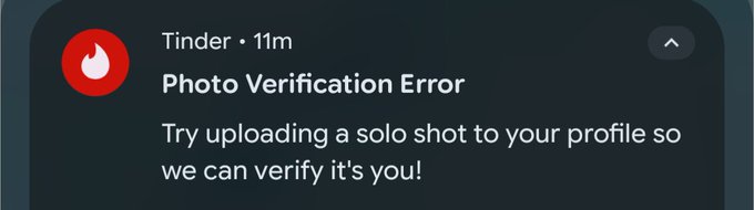 A Tinder notification showing a 'Photo Verification Error' message asking the user to 'Try uploading a solo shot to your profile so we can verify it's you!'