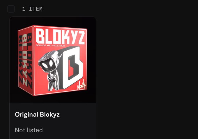 A digital interface displays '1 ITEM' above an image of a red 'BLOKYZ' collectible box, labeled 'Original Blokyz' and 'Not listed'.