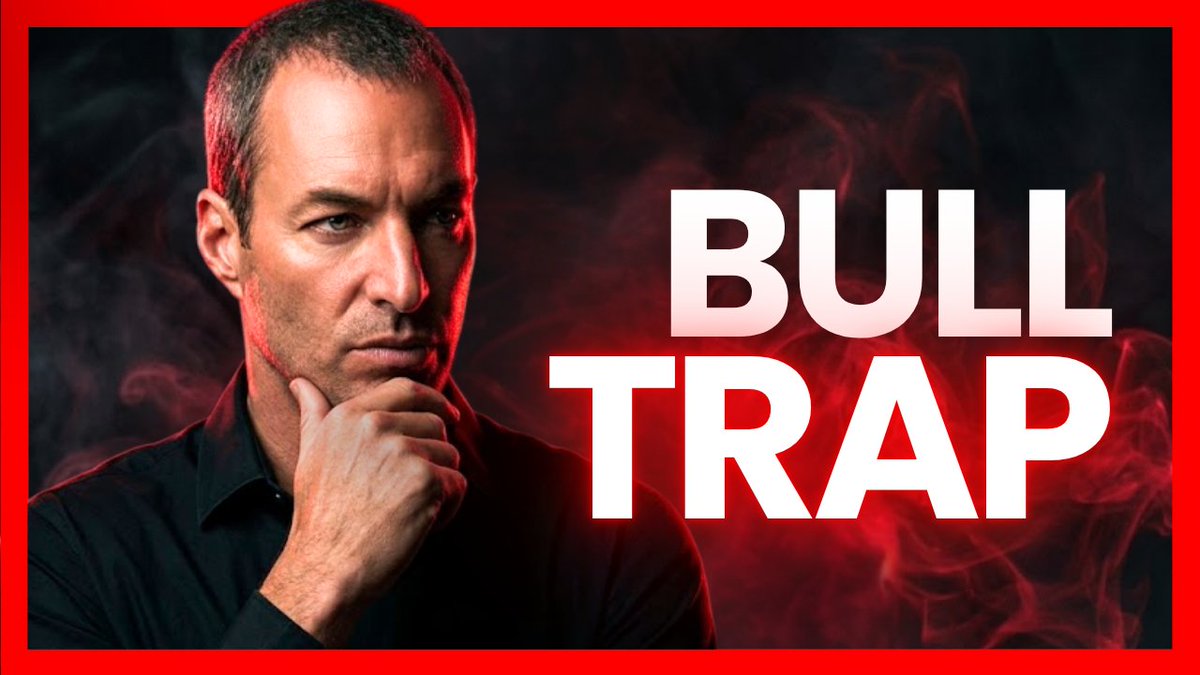 A man with a serious expression rests his chin on his hand against a dark background filled with red smoke, beside the bold white text "BULL TRAP" framed by a red border. The image pairs with the post's warning about record U.S. debt accumulation, soaring Treasury yields, and government bond purchases—portraying the "bull trap" as a deceptive market rally masking the early stages of a currency collapse.