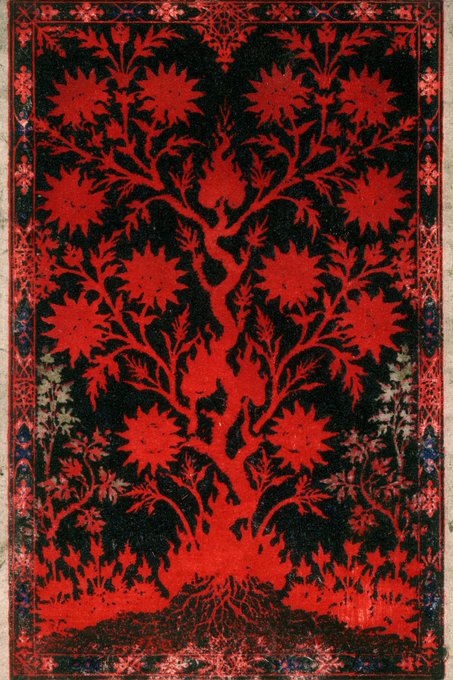 A vibrant red and black "Tree of Life" design rendered on a tarot card, featuring intricate roots, branches, and floral motifs against a dark background, bordered by ornamental patterns. The image corresponds to the "Ace of" tarot card referenced in the post, which has been collected on SuperRare.