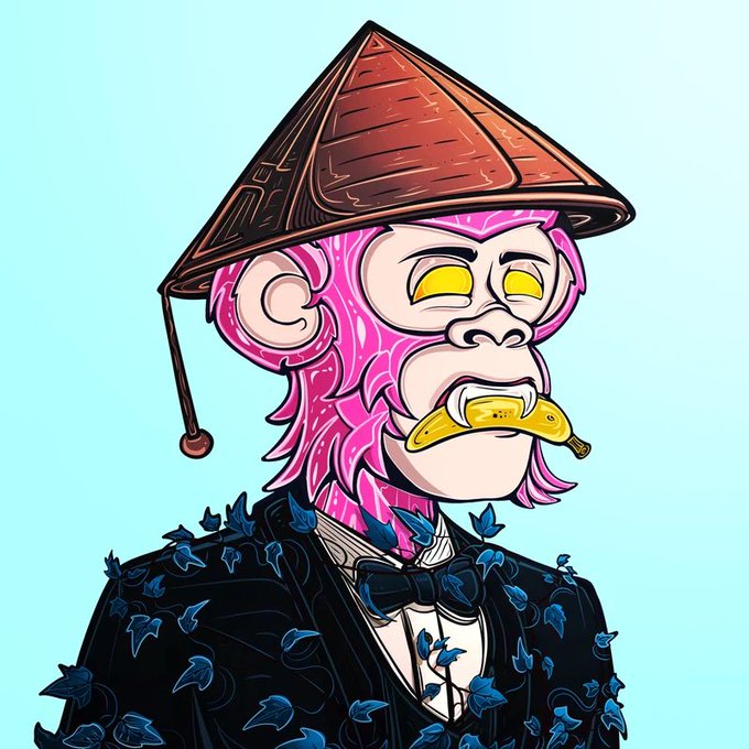 A cartoon-style NFT portrait of a pink-skinned ape character wearing a graduation cap and black robe, with a banana in its mouth and blue flowers covering its clothing.