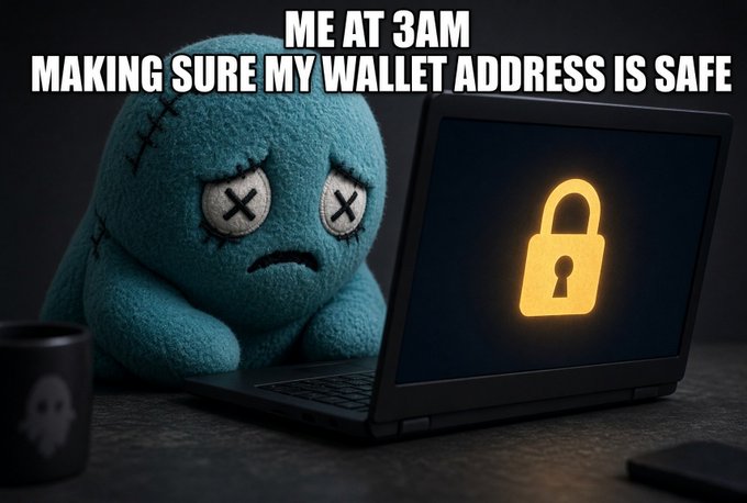 A 3D rendering of a sad, blue, stitched plush monster sitting next to an open laptop displaying a glowing yellow padlock, with meme text reading 'ME AT 3AM MAKING SURE MY WALLET ADDRESS IS SAFE'.