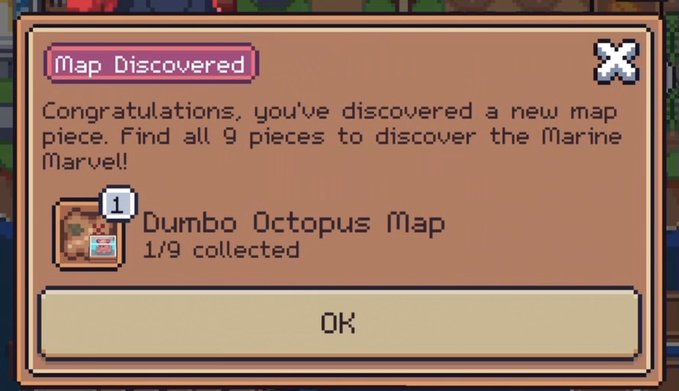 A pixel art notification pop-up from a video game reading 'Map Discovered,' congratulating the player on finding the 'Dumbo Octopus Map' (1/9 collected) to discover the Marine Marvel.