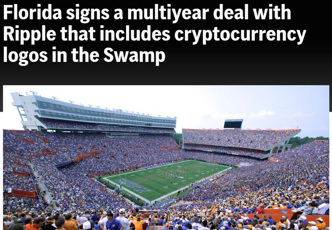 A news-style graphic with text 'Florida signs a multiyear deal with Ripple that includes cryptocurrency logos in the Swamp' above a packed football stadium.