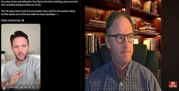 A screenshot of a video featuring two men discussing market manipulation, with text reading 'OPEN YOUR EYES' and references to the Clarity Act and retail investors.
