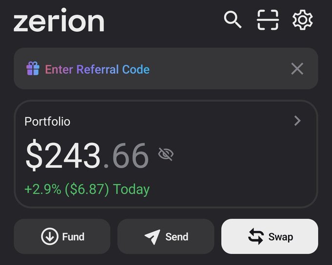 A Zerion crypto wallet interface displaying a portfolio value of $243.66 with +2.9% ($6.87) gain today, featuring a referral code entry field and Fund, Send, and Swap buttons.
