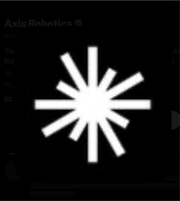 A loading screen with a white spinning star/burst icon on a dark background, with faint text 'Axis Robotics' visible.